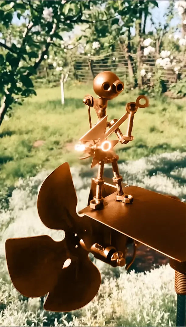 Metal wind turbine “Rock Band” – Moving garden decoration with character