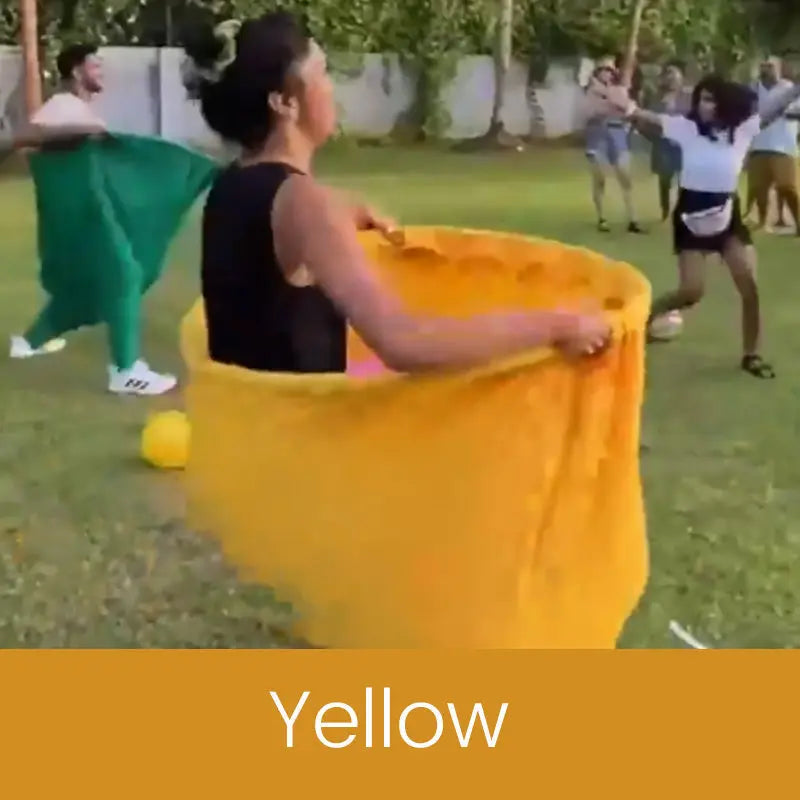 Outdoor catching game with giant pants for group fun